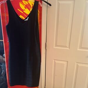 Dalia Collection Black Sleeveless Midi Dress or top.